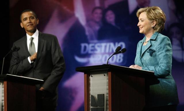 A person and person at a podium Description automatically generated