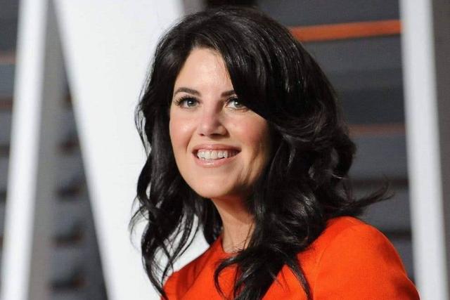 A person with long black hair Description automatically generated