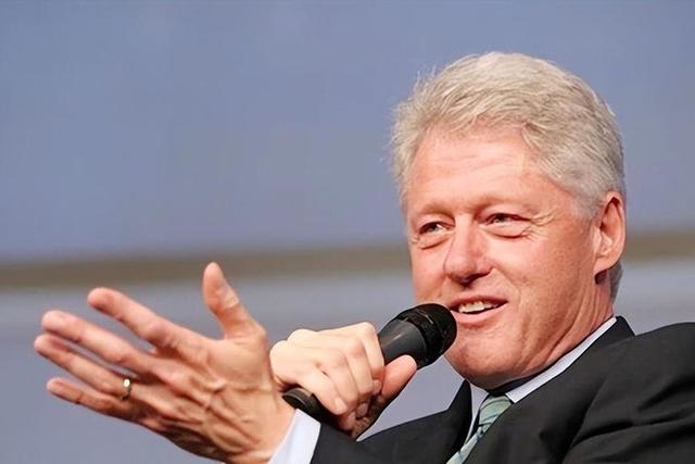 A person speaking into a microphone Description automatically generated