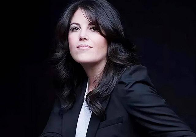 A person with long black hair Description automatically generated